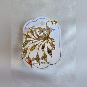 Elegant Gold Peacock Brooch with Multicolor Gems